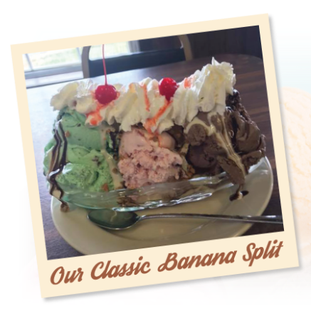 Banana split with three scoops and toppings